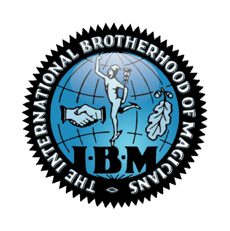The International Brotherhood of Magicians logo featuring a handshake, a figure performing a magic trick, and the letters "IBM."