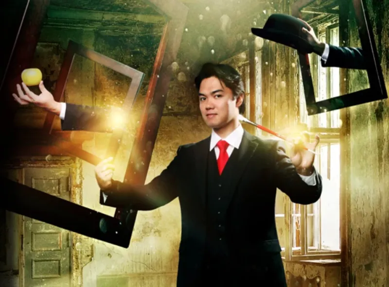 Magician performing a mystical trick with floating objects and frames in an enchanted, atmospheric setting.