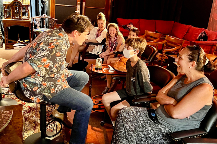 a group of people sitting at a table